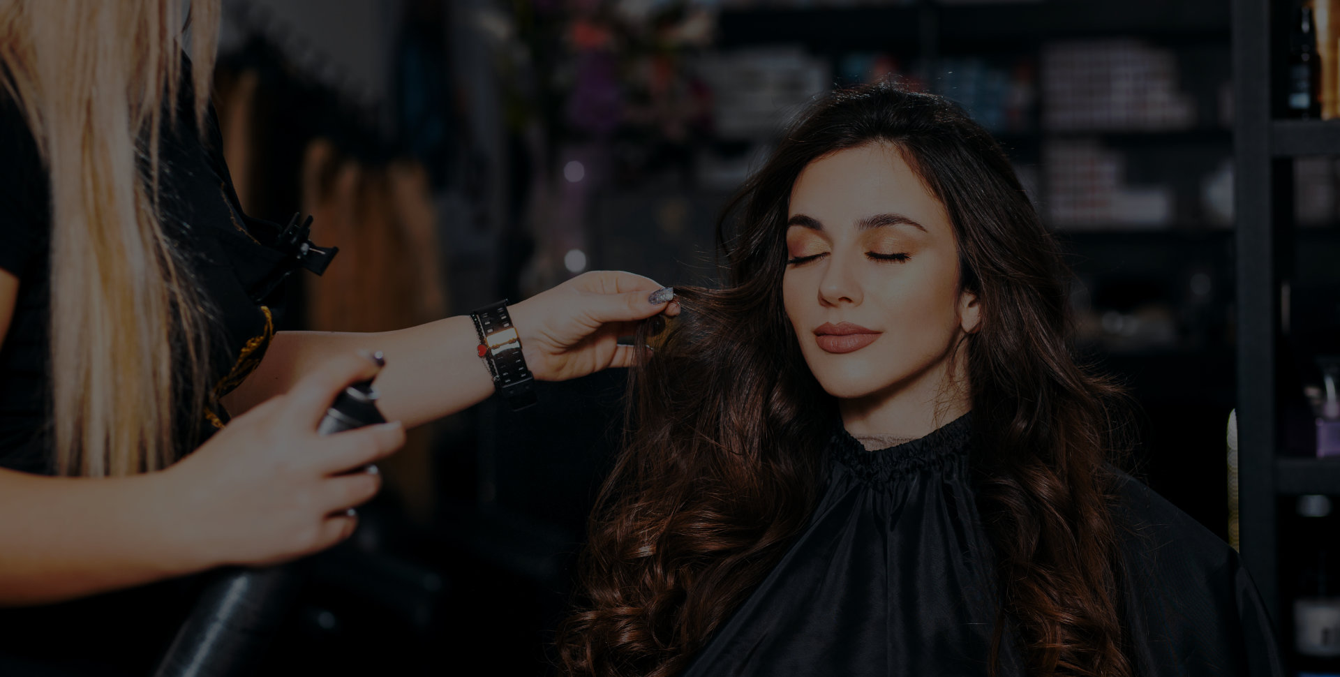a woman getting hair done