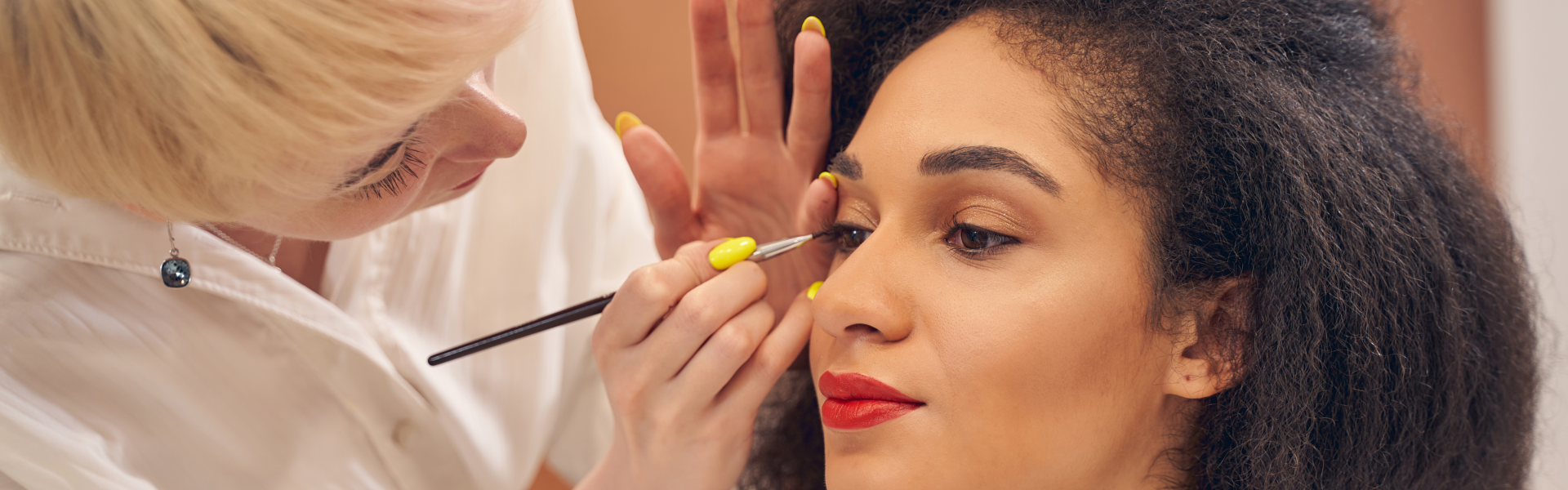 woman doing makeup